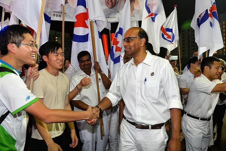 Mr Tharman Shanmugaratnam and his team from Jurong GRC got the best result for the PAP with 79.3 per cent of the votes. Mr Teo Chee Hean from the PAP team for Pasir Ris-Punggol GRC greeting supporters at Bedok Stadium.