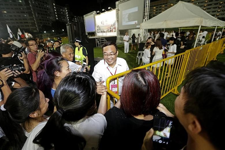 Mr Cedric Foo (left) retained Pioneer for the PAP, while Hong Kah North voters gave their MP Amy Khor another term.