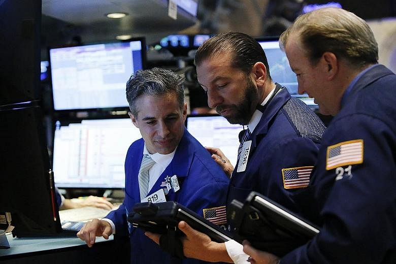 Traders on the main trading floor of the New York Stock Exchange. The months of September and October throughout history have been witness to famous stock market crashes - for example, that following the terrorist attacks on New York's World Trade Ce