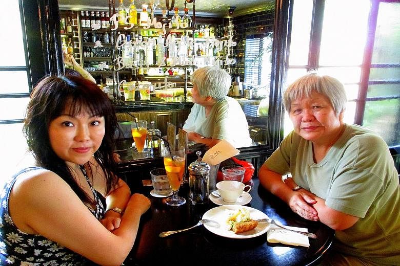 Ms Amy Lam (right) with her niece Daisy Chua at a cafe in Ann Siang Hill. Recounting her secondary school days, Ms Lam says she can swim long distances but not fast - and has tested her endurance by completing the Appalachian Trail in the US over 127