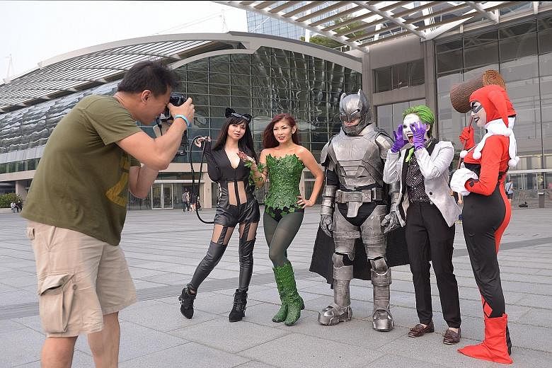 Singapore hosted a meeting of "superpowers" yesterday - as cosplay enthusiasts attended a convention dressed as comic book characters. (From far left) Ms Tiffany Neo, Ms Cara Neo, Mr Ian Toh, Ms Nurfilzah Rohaidi and Ms Siti Zahara brought Gotham Cit