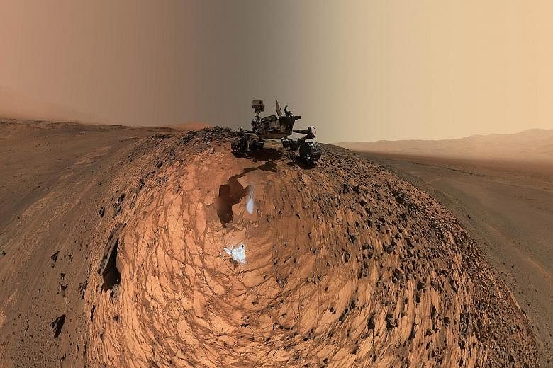 This Nasa image shows the Curiosity Mars rover collecting a sample. Budget uncertainties may endanger such vital equipment.