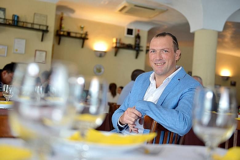 Al Forno's chef and owner Alessandro Di Prisco (above) says he grew up enjoying daily home-cooked meals which were elaborate affairs.