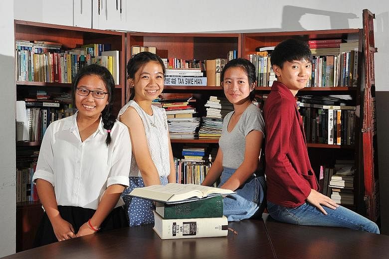 (From left) Students Debbie Abby Wong, Nicole Nurulam, Tricia Chee and Chung Ke Win from Jurong Junior College, who are taking translation for their A levels, interned at a translation firm during their June holidays to gain hands-on experience.