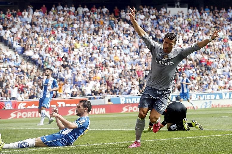 Real Madrid star Cristiano Ronaldo scored five times against Espanyol to become his club's record scorer in Spain's top flight with 230 goals in just 203 league games.