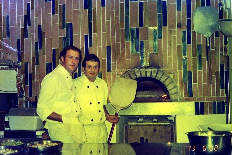 Mr Alessandro Di Prisco (above) and his Al Forno chef Rodolfo Baldino in a picture taken in 2002