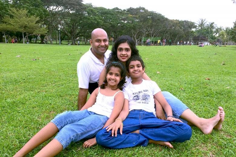 Mr Manoj Vasudevan with his wife, Ms Sindu Sreebhavan, son Advaith and daughter Aditi in a family outing at Pasir Ris Park. Mr Vasudevan reached the championship's semi-finals in 2012 and 2013. The third placing on Aug 15 was his first win in the competit