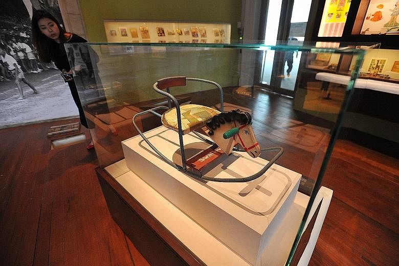 Relive the experience of Singapore's only open-air drive-in cinema, which used to be in Jurong - sit in cars (right) to watch a montage of archival clips. Part of the Asian Civilisations Museum collection, this gramophone's distinctive flower-shaped 