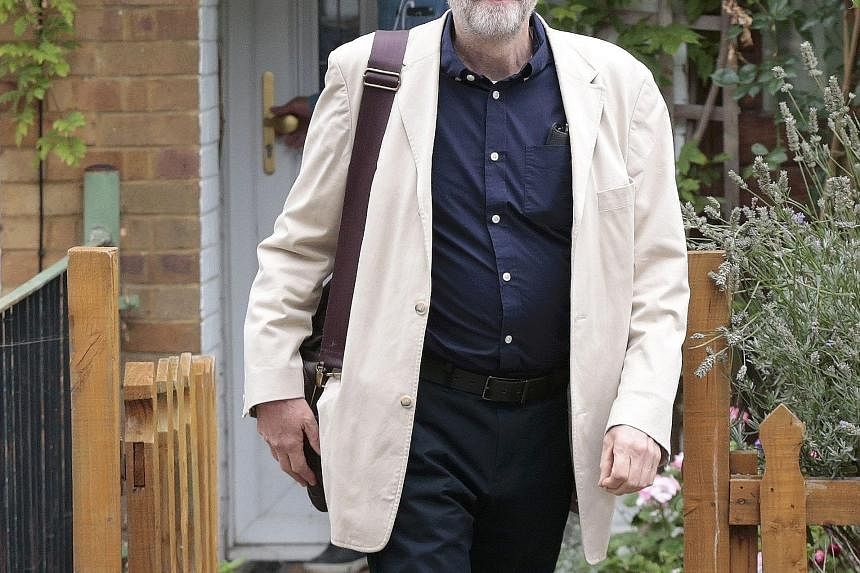 Mr Jeremy Corbyn leaving his home the morning after being elected as the new leader of Britain's opposition Labour Party. He has picked a shadow Cabinet almost as inexperienced and largely as left-wing as himself.