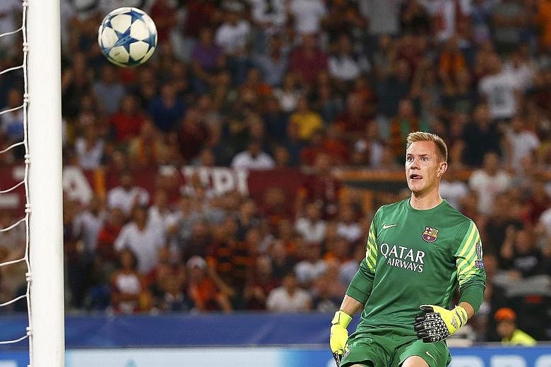 Stranded Barcelona goalkeeper Marc-Andre ter Stegen has no answer to the dramatic equaliser by Roma's Alessandro Florenzi (above) during their Champions League match in Rome on Wednesday. "I couldn't believe it went in," said Florenzi of his shot fro