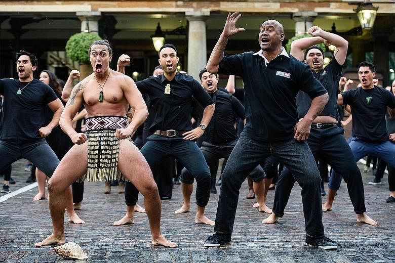 Former New Zealand star Jonah Lomu (front, right) and members of the Ngati Ranana London Maori Club doing the haka during a photocall at a MasterCard event in London's Covent Garden. The All Blacks are the favourites to win a third World Cup.