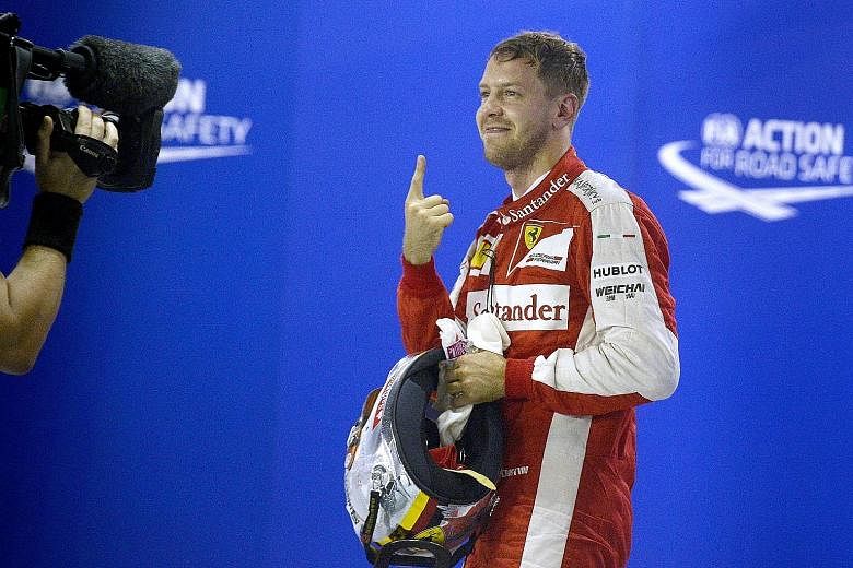 It's back! Sebastian Vettel's index-finger salute, that is. The German Formula One driver was celebrating snaring pole position last night for today's Singapore Airlines Singapore Grand Prix. It was Ferrari's first pole since the German Grand Prix in