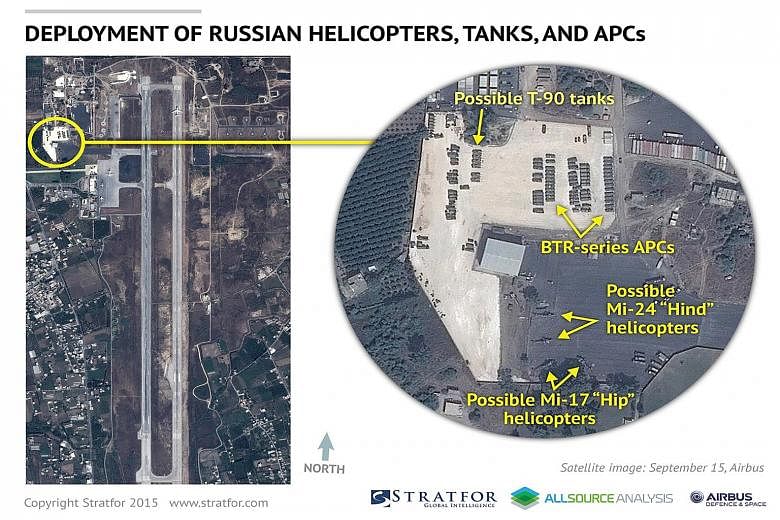 Airbus Defence and Space satellite images show a Russian AN-124 transport plane (far left) and possible Russian tanks and military helicopters (left) at the airbase at Latakia, Syria last week.