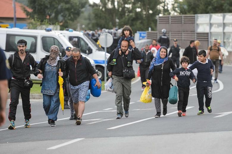 Migrants Start Arriving In Austria Across Slovenian Border, Opening New ...