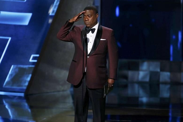 Comedian Tracy Morgan, who was involved in a serious car accident last year, returned to the stage to present the best drama award.