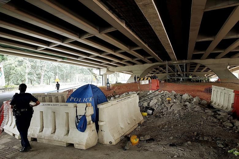 Four construction workers fell from a temporary working platform below the Yio Chu Kang flyover yesterday.
