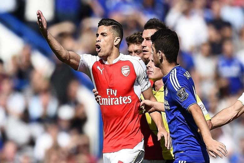 Arsenal defender Gabriel Paulista has been charged by the FA for his extended protests after being sent off during their 0-2 loss to Chelsea.