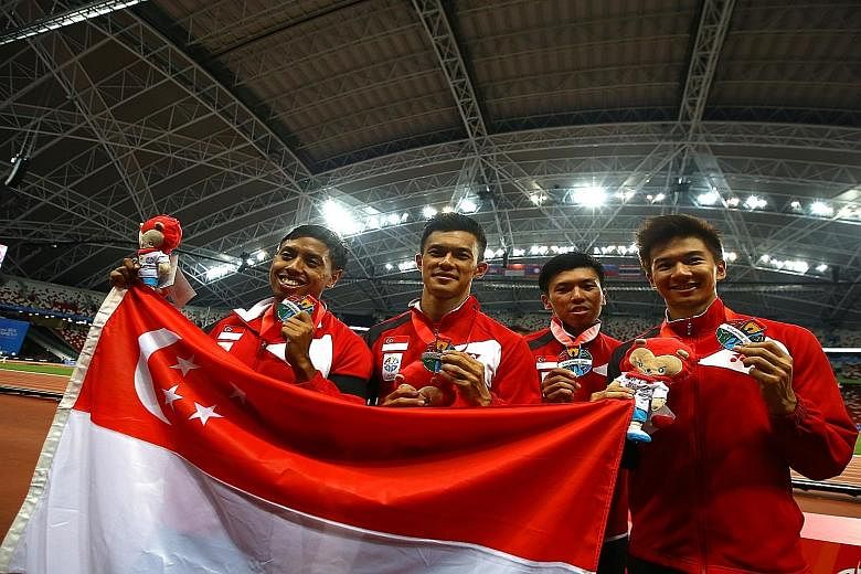 (From left) Amirudin Jamal, Lee Cheng Wei, Gary Yeo and Calvin Kang with their SEA Games silver medals in June. They clocked a 4x100m national record of 39.24sec. Amirudin, Lee, Yeo and reserve Elfi Mustapa have retired, leaving only Kang and reserve
