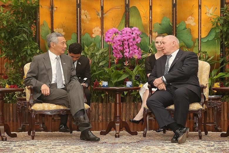 Prime Minister Lee Hsien Loong (far left) and Governor- General Peter Cosgrove reaffirmed bilateral ties between Singapore and Australia.