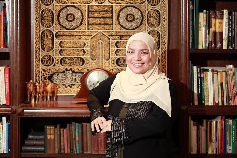 Dr Sharifah Mariam Aljunied, 47, at home in Pasir Ris. She is a descendant of Singapore's first Arab resident Syed Omar Ali Aljunied, who built Singapore's first mosque in 1820 - the Masjid Omar Kampong Melaka in Keng Cheow Street. He also gave Raffl