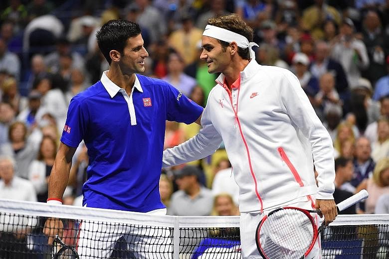 Novak Djokovic (left) greeting Roger Federer before their US Open final clash. The world's top two players are set to continue their rivalry in Singapore in December when they compete in the International Premier Tennis League.