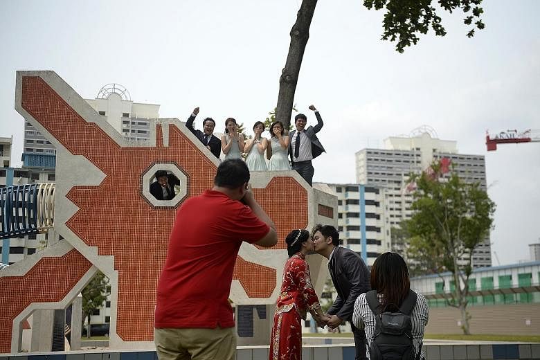 With the haze clearing up to healthier levels yesterday afternoon, newlyweds Mr Han Yap and Ms Ng Mei Fen, both 29, were able to go ahead with their outdoor photo session at a playground in Toa Payoh Lorong 6.