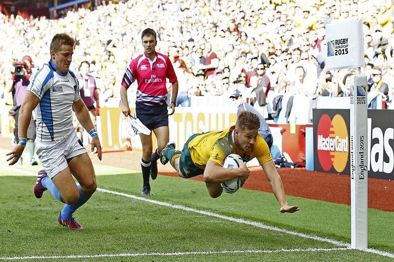 Drew Mitchell scoring his second try and Australia's seventh. A likely full-strength side will tackle fellow giants England and Wales.