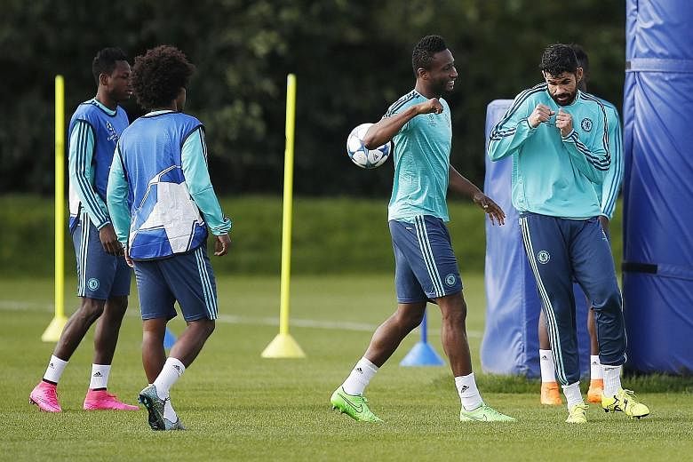 Chelsea's Diego Costa (right) and John Obi Mikel during training. The Spaniard's ban does not cover Europe so he will be raring to play tonight.