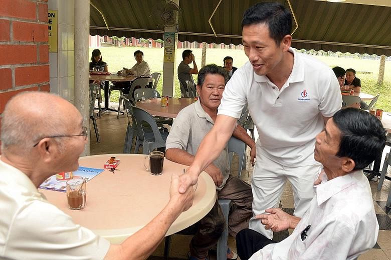 Mr Ong Ye Kung (left) and Mr Ng Chee Meng (right), during campaigning for the Sept 11 polls. The two newly-elected MPs will jointly helm the Education Ministry. PM Lee said he had known both men before they entered politics and felt they were well-pl