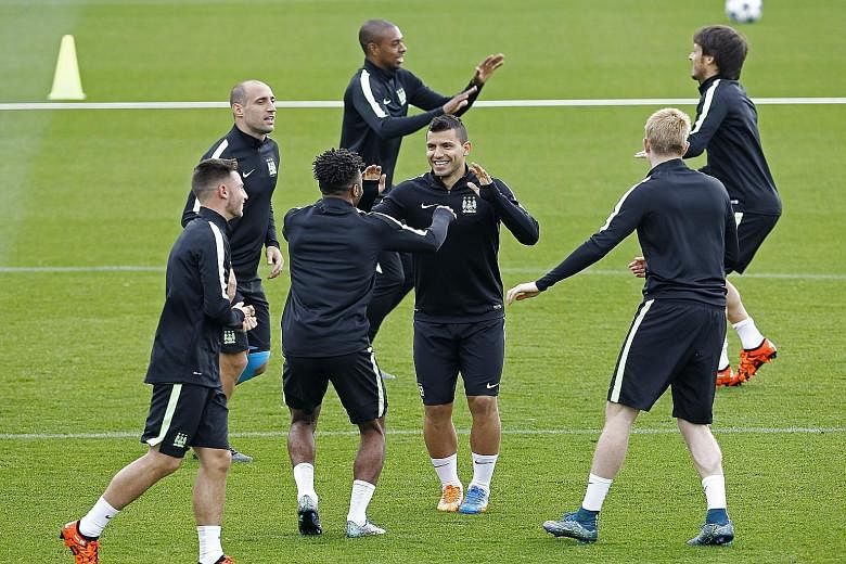 After suffering a 4-1 defeat by Tottenham on Saturday in the Premier League, Manchester City players (left, in training) will hope that they do not stumble in the Champions League against Moenchengladbach. They lost to Juventus in their first group-s