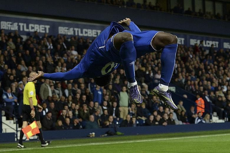 An exuberant Romelu Lukaku doing a somersault after scoring Everton's winning goal as the Toffees came back from 0-2 down to win 3-2 against West Bromwich Albion. Everton move up to fifth in the Premier League table.