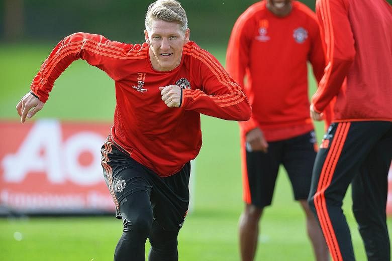 Bastian Schweinsteiger (left) is keen to give advice to Manchester United's young strikers Memphis Depay and Anthony Martial on how to deal with Champions League opponents.
