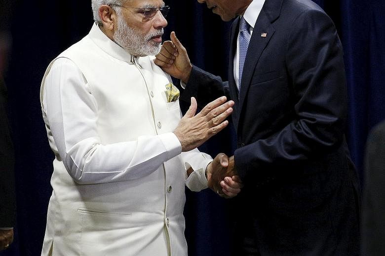 Mr Narendra Modi said he and Mr Barack Obama were committed to fighting climate change without hurting development.