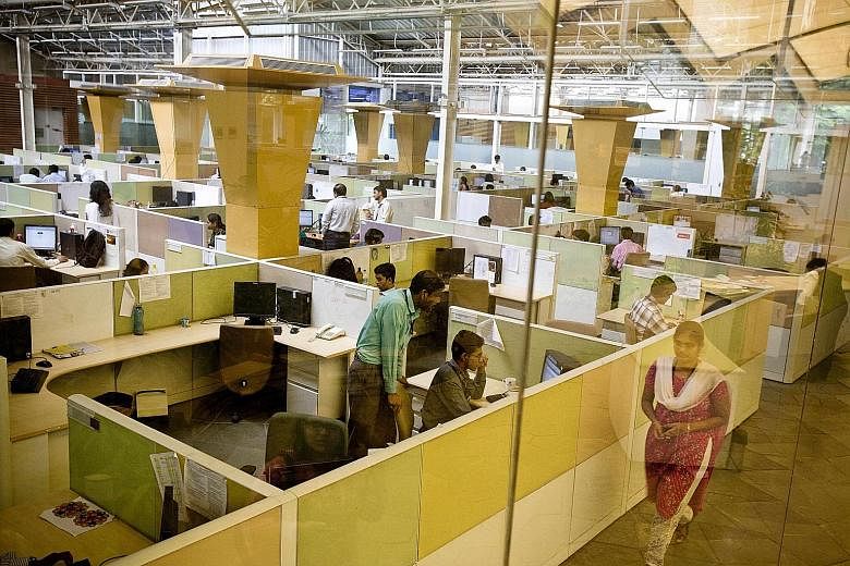 The Mumbai office of Indian outsourcing giant Tata Consultancy Services. In recent years, global outsourcing and consulting firms have obtained thousands of temporary visas to bring foreign workers into the US who have taken over jobs held by America