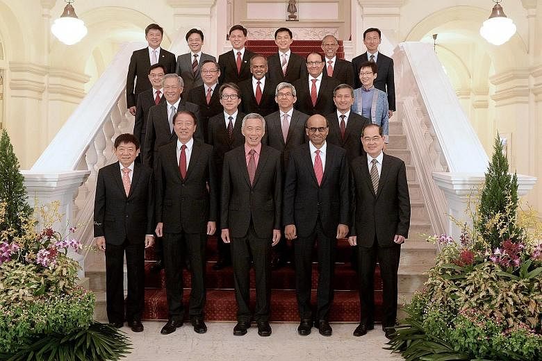 The Cabinet (front row, from left): Coordinating Minister for Infrastructure and Minister for Transport Khaw Boon Wan, Deputy Prime Minister and Coordinating Minister for National Security Teo Chee Hean, Prime Minister Lee Hsien Loong, Deputy Prime M