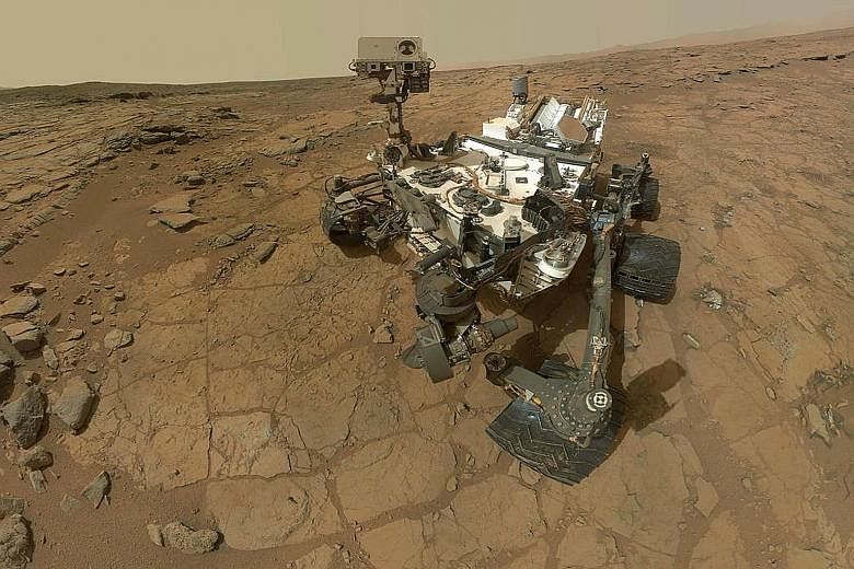 A self-portrait of Nasa's Mars rover Curiosity, a multi-billion-dollar robot dispatched to search for life. There are risks that microbes from Earth on the machine may harm whatever life is on Mars or that "signs of life" discovered may turn out to b