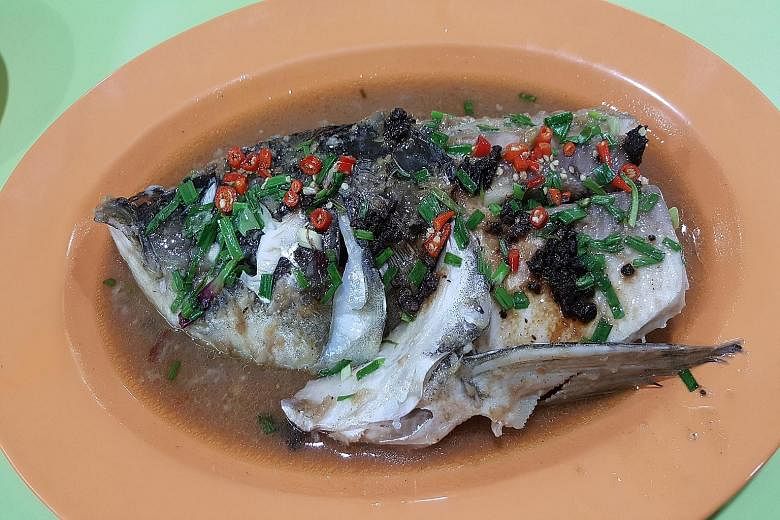 For two people, pair the steamed fish head in bean sauce (above) with a small plate of sambal tapioca leaves.