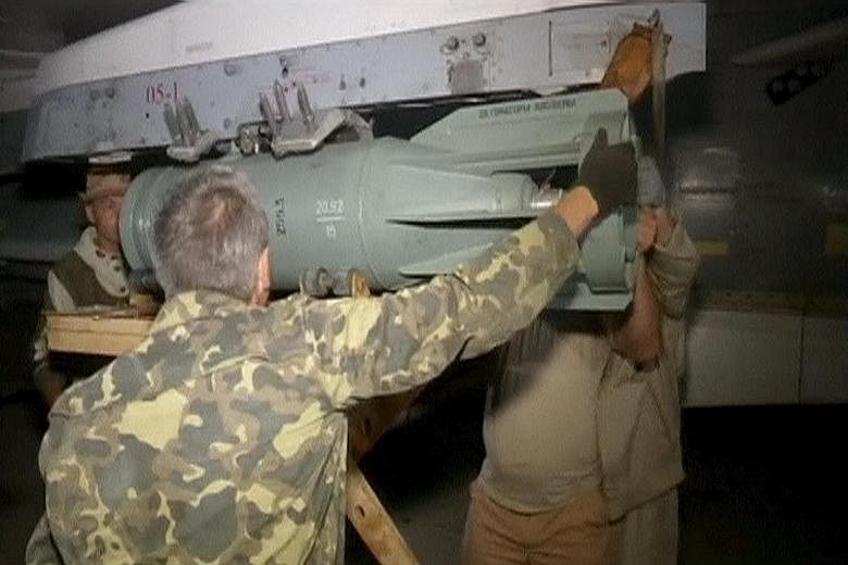 A screeenshot showing technicians servicing a Russian military jet in Syria was released last Thursday. Russia has deployed different types of combat aircraft there for ground and air missions.