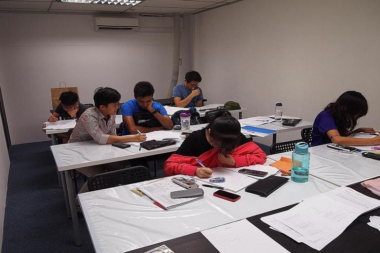 Students at Quintessential Education Centre, which has short courses for O and A levels. Parents should make sure that their children take breaks in between revision.