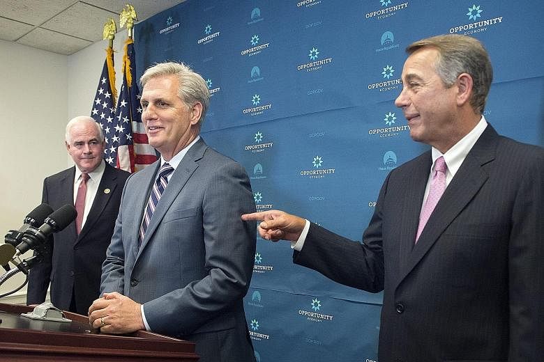 Mr Kevin McCarthy (centre) is the front runner to replace Mr John Boehner (right) as Speaker of the House.