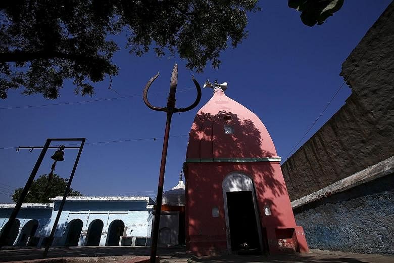 The temple in Bisada village in Uttar Pradesh that alerted the villagers to the "cow killing". Vigilantes from Save the Cow heard a rumour that a cow's slaughtered remains had been found near an electrical transformer and went hunting for the alleged