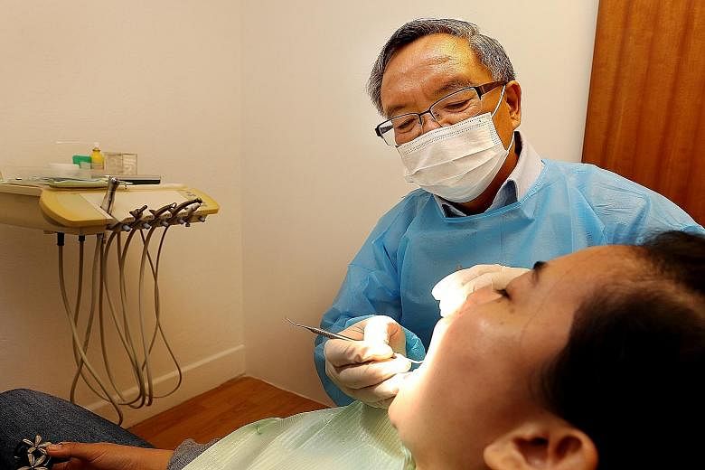 Dr Lewis Lee of Robertson Choo Oehlers Lee & Lye co-heads the volunteer team at HealthServe's new dental clinic that opens in Geylang today. The team will start off with one session every Wednesday evening. For foreign workers who are out of work, th