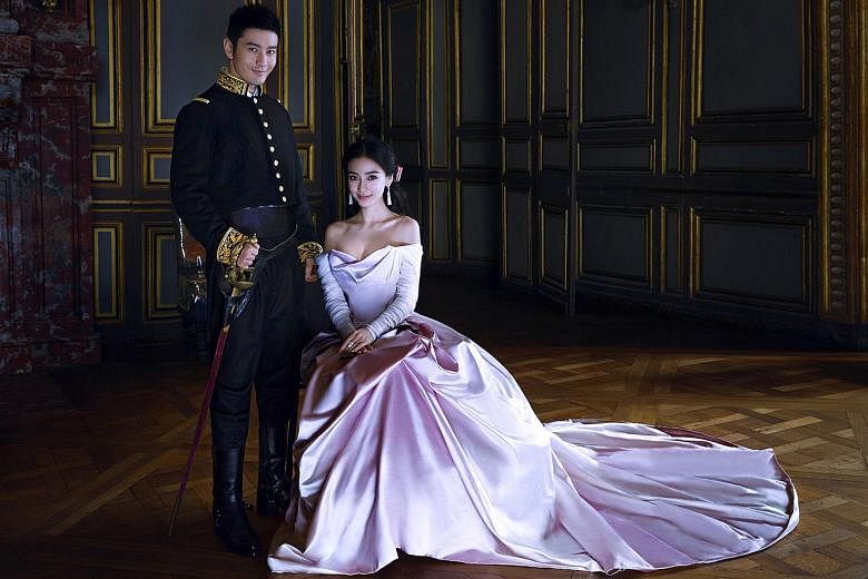 Actors Huang Xiaoming and Angelababy hold fairy tale like wedding