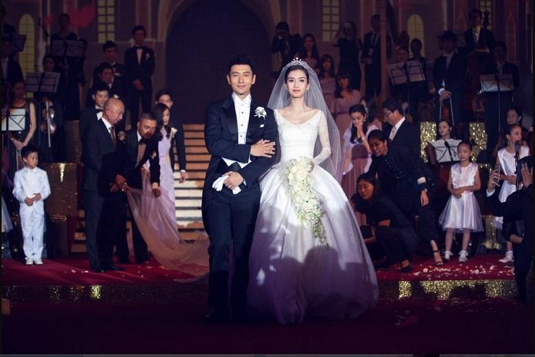 Actors Huang Xiaoming and Angelababy hold fairy tale like wedding