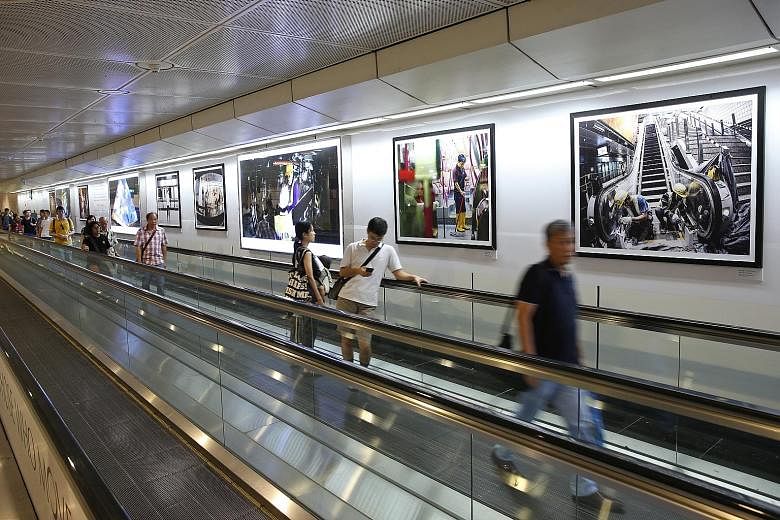 Commuters at Dhoby Ghaut MRT station can get a behind-the-scenes glimpse into the building of Singapore's new train lines through a photo exhibition put together by the Land Transport Authority and Canon Singapore. The exhibition, Those Who Move Us, 