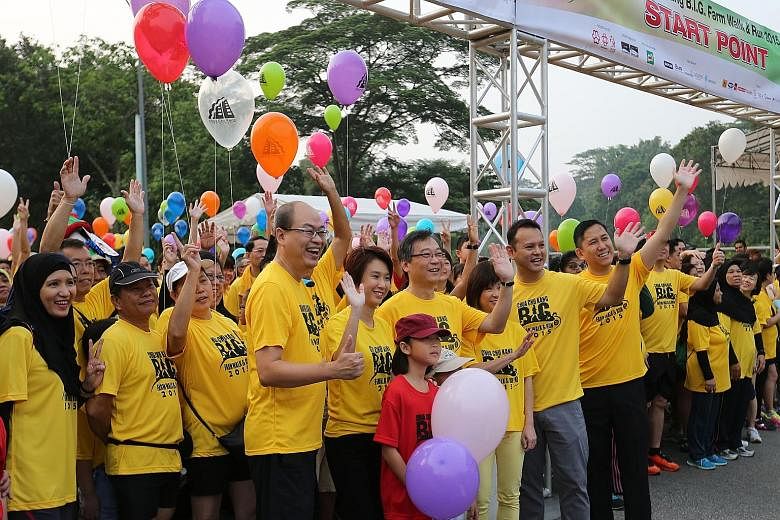 Close to 7,000 participants took part in the Chua Chu Kang B.I.G. Farm Walk and Run yesterday. The event in Brickland Road, which was organised by Chua Chu Kang GRC and Hong Kah North SMC, was attended by their MPs. They are (from left in row behind 