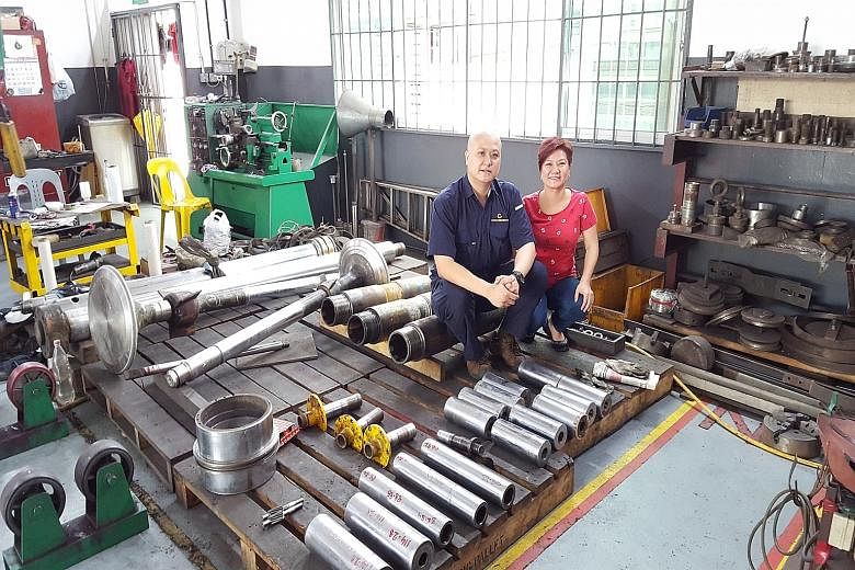 Director of Toyo Chromium Engineering Emily Tan and her brother, Mr Larry Tan, the company's managing director. Besides being affected by falling oil prices, the firm is facing a labour crunch.