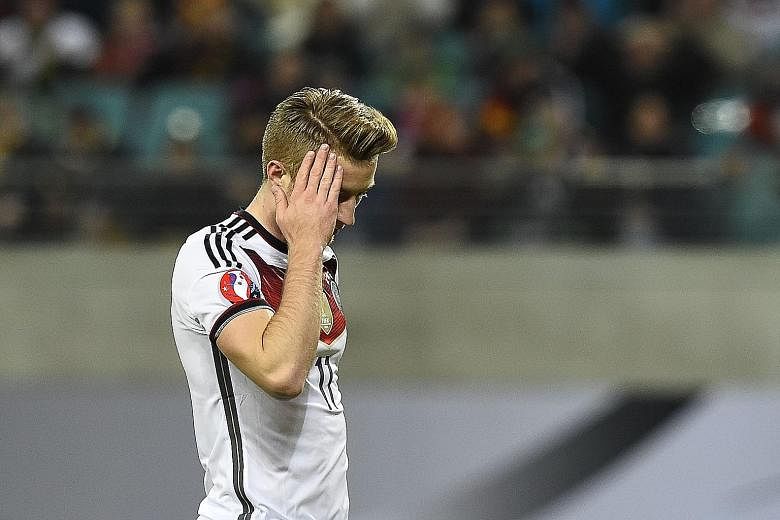 Marco Reus ruing yet another miss against Georgia. Though Germany won their group, they have not adapted to changes.
