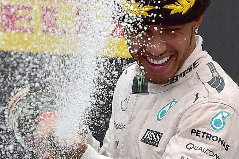 Lewis Hamilton after winning the Russian Grand Prix last weekend. On the brink of a third world title, he and four-time world champion Sebastian Vettel of Ferrari could become the most dominant rivals in F1 annals, while Nico Rosberg must regroup nex