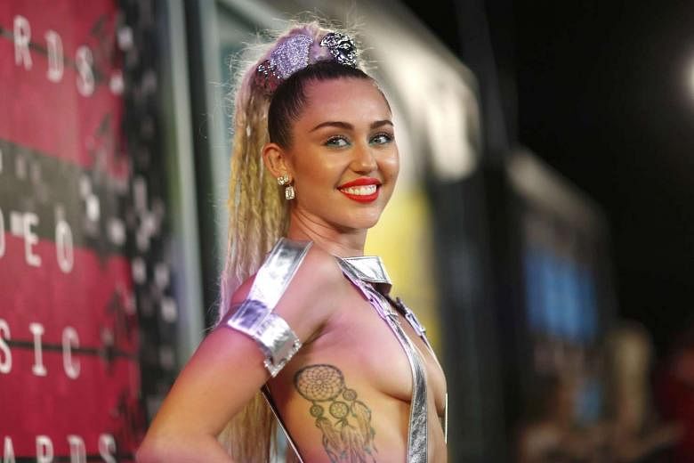 780px x 520px - Miley Cyrus, Flaming Lips plan nude concert | The Straits Times